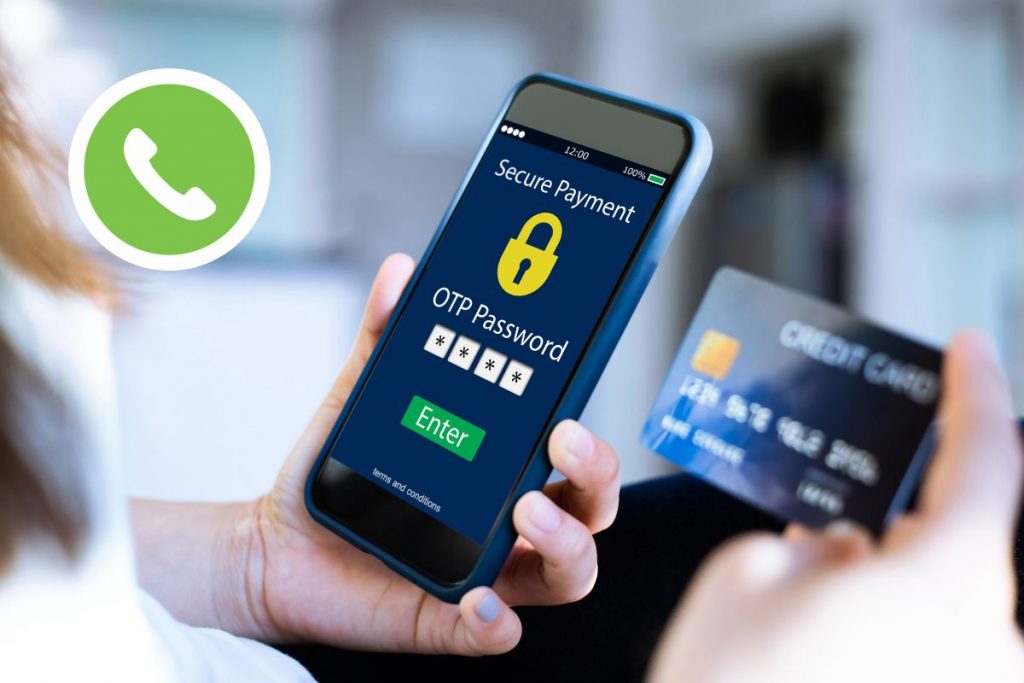 handphone, password otp dan logo WhatsApp